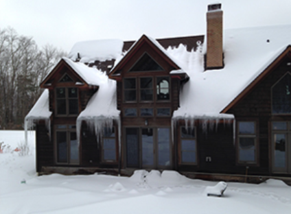 Above: Without spray foam insulation heat escapes through the roof causing snow melt which ultimately creates ice dams causing structural damage to your home.
